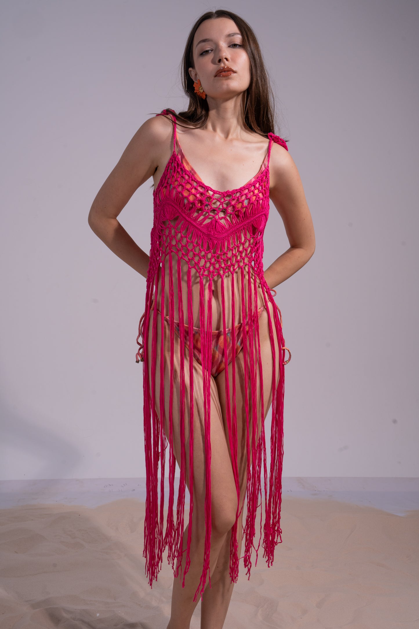 Hot pink coverup with long fringes