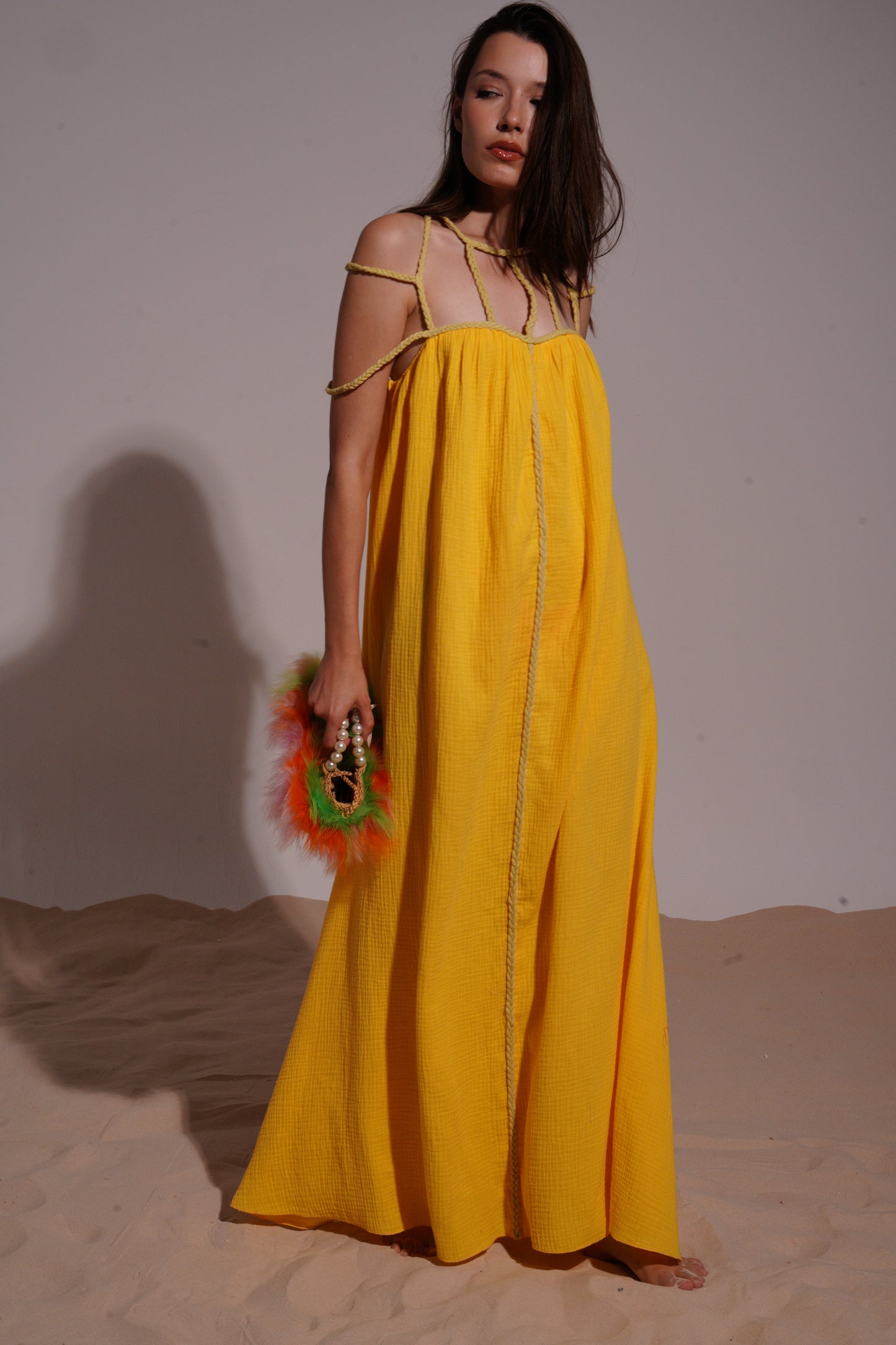 Yellow long dress with stripped necklace