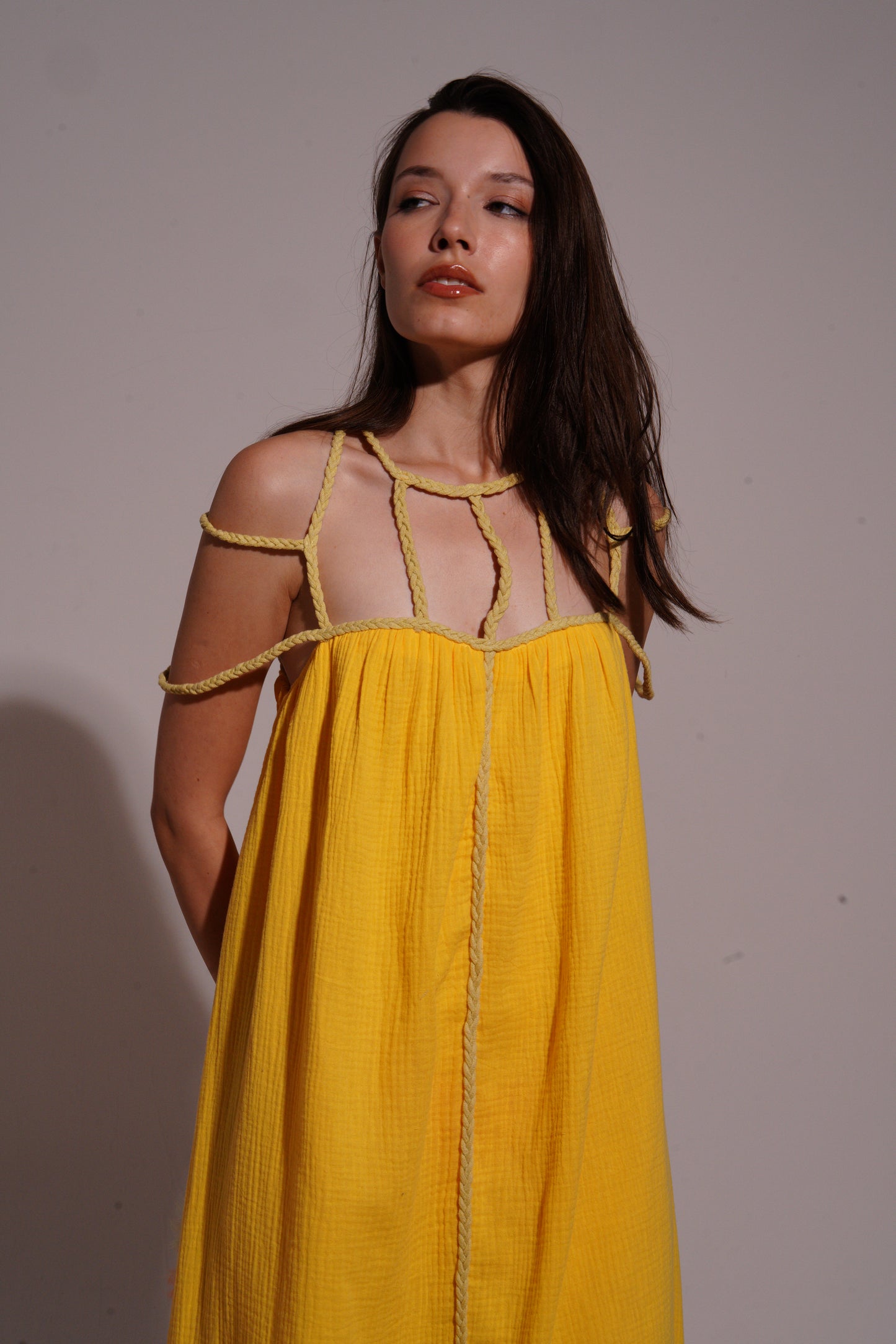 Yellow long dress with stripped necklace