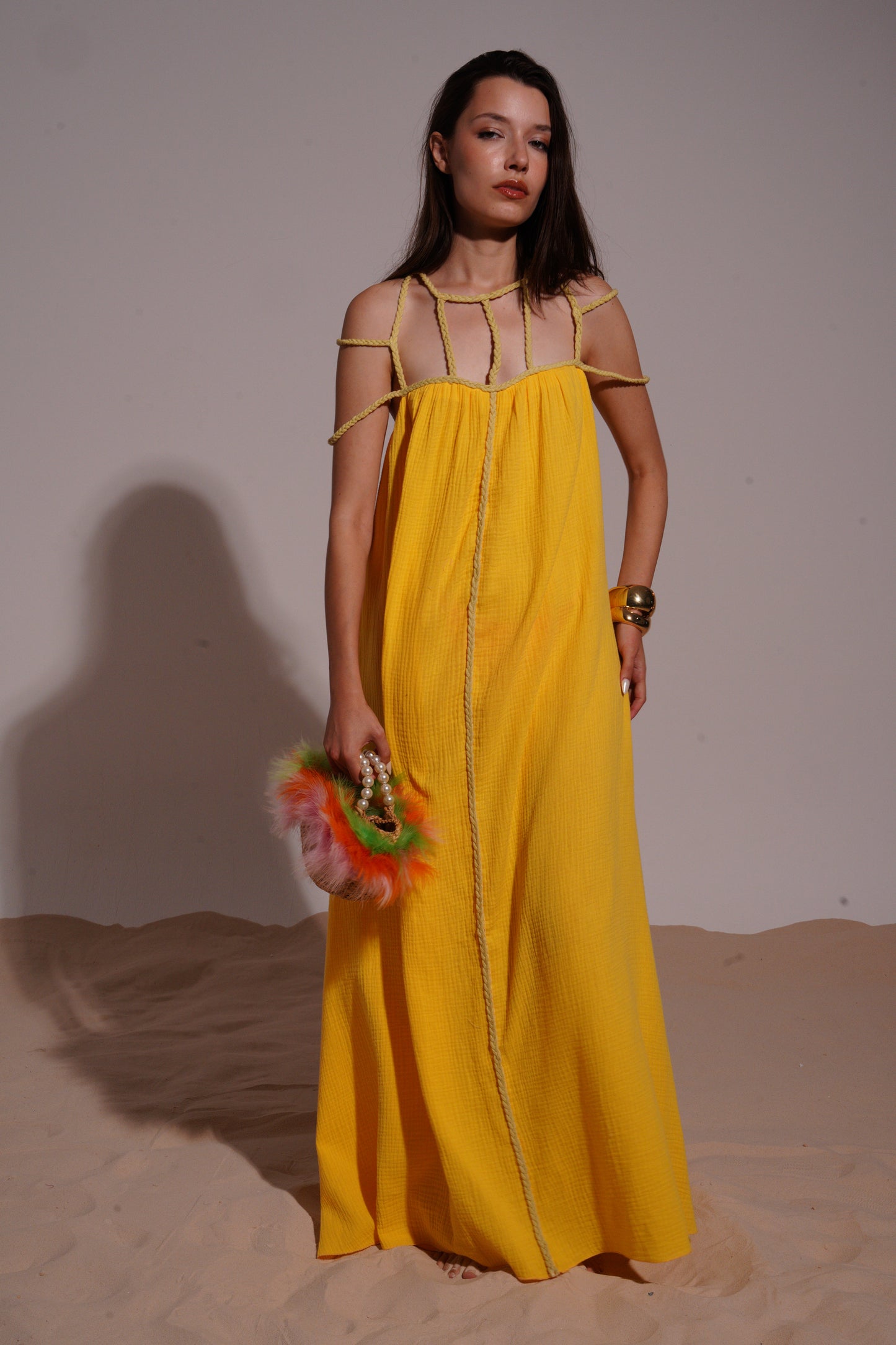 Yellow long dress with stripped necklace