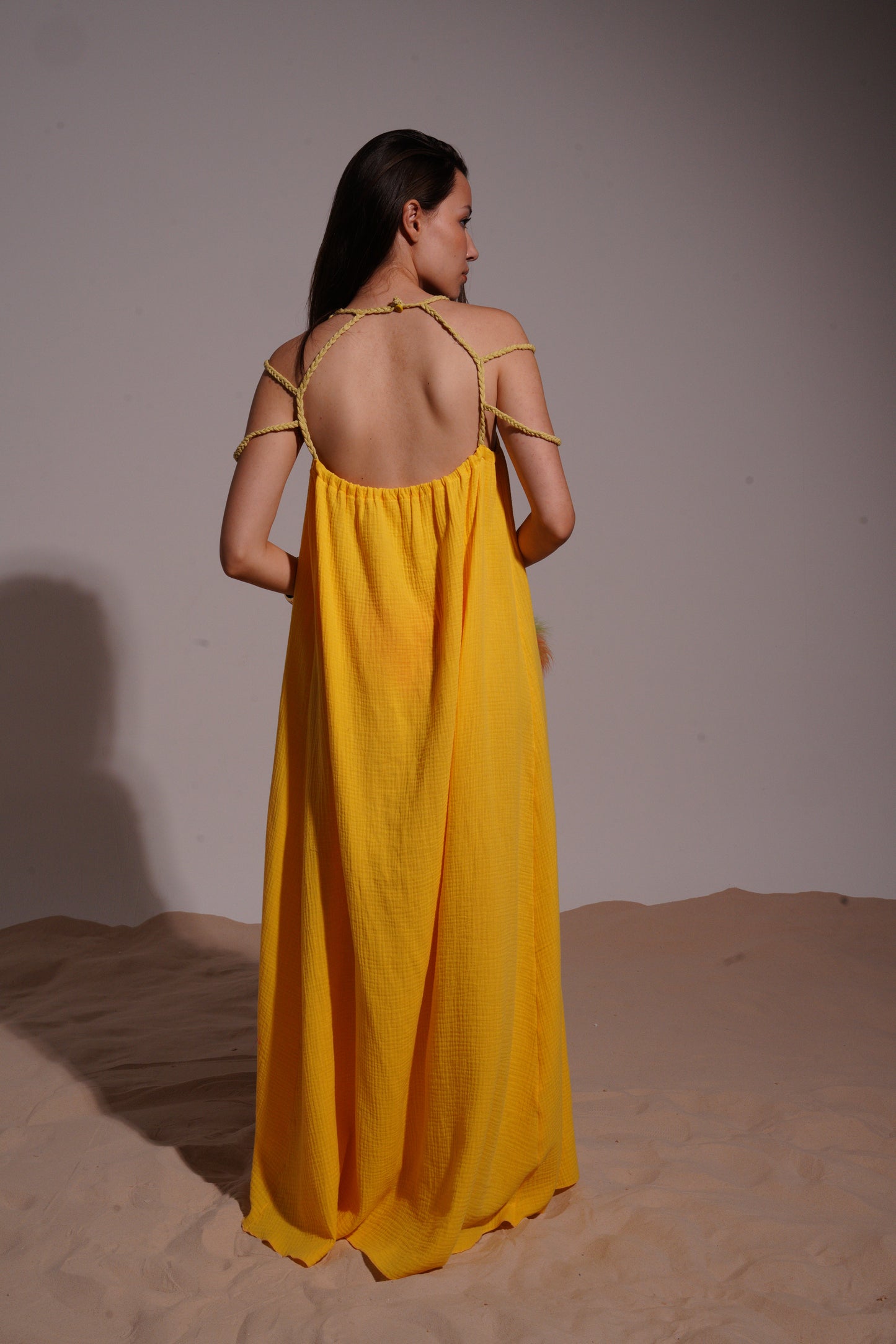 Yellow long dress with stripped necklace